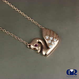 Diamond & Ruby Swan Pendant Necklace In 14K Rose Gold - Diamond Rise Jewelry