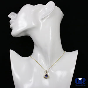 Natural Trillion Tanzanite & Round Diamond Pendant Necklace In 14K Yellow Gold - Diamond Rise Jewelry