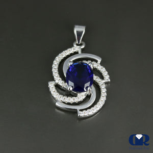 Women's Oval Sapphire & Diamond Pendant In 14K Gold - Diamond Rise Jewelry