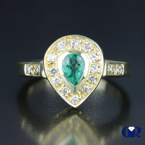 Women's Pear Cut Emerald & Diamond Cocktail Ring / Right Hand Ring In 14K Yellow Gold - Diamond Rise Jewelry