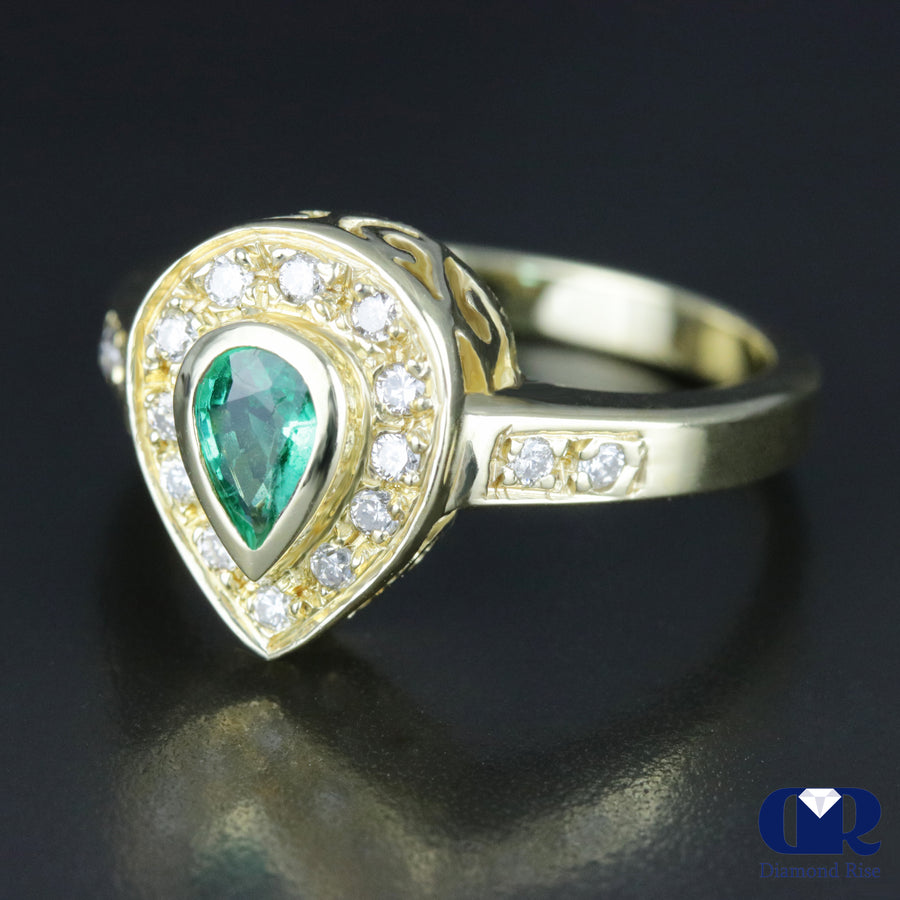 Women's Pear Cut Emerald & Diamond Cocktail Ring / Right Hand Ring In 14K Yellow Gold - Diamond Rise Jewelry